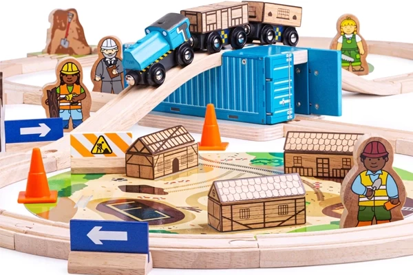 Enthält Häuser, Straßenschilder und Bauarbeiter